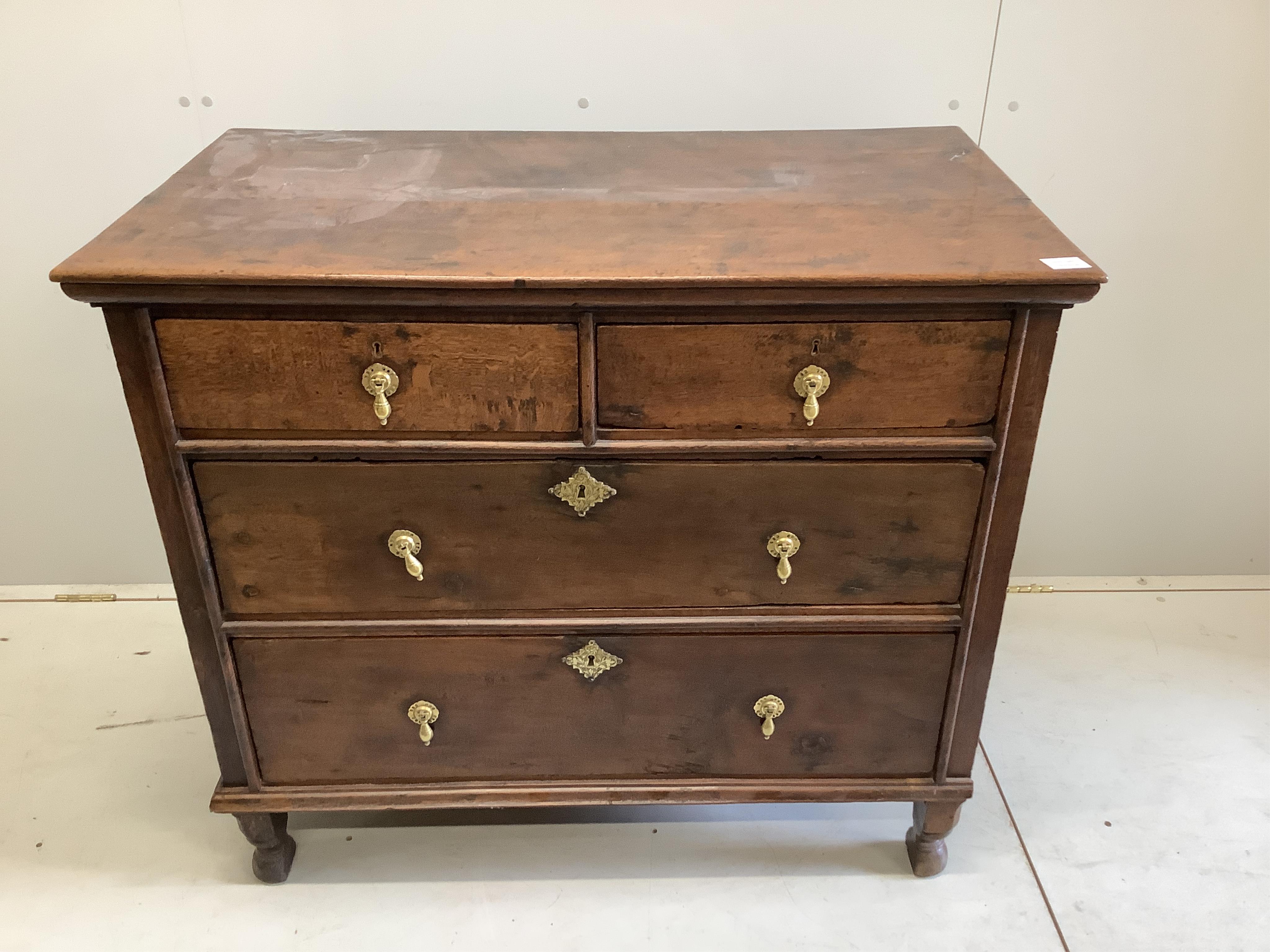 A late 18th century oak chest, fitted with two short and three long drawers, width 102cm, depth 58cm, height 88cm. Condition - fair